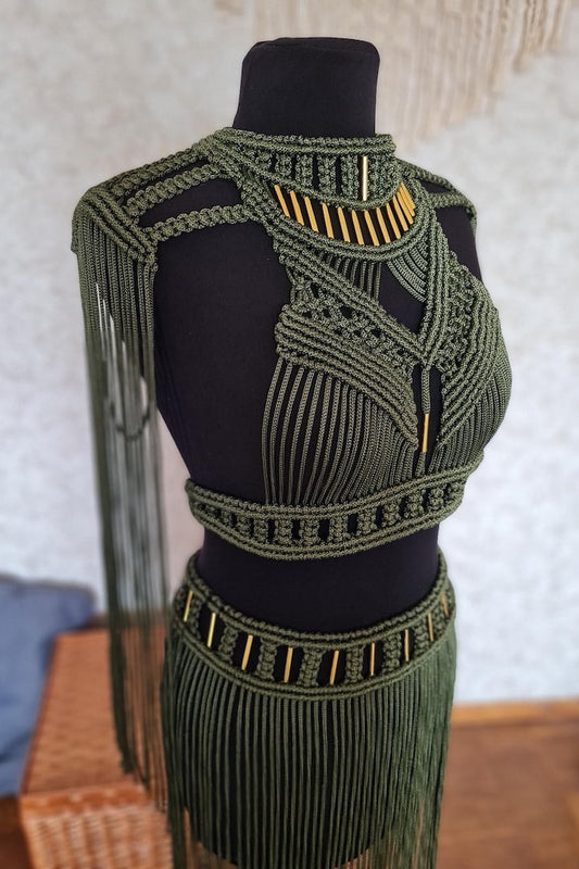 Green macramé top and skirt set on a mannequin against a neutral background